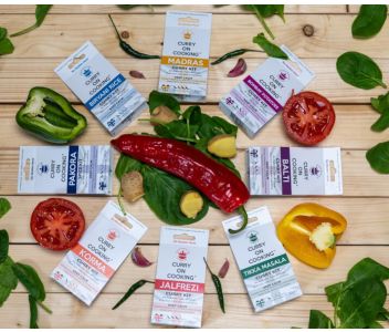 8 Curry Kits with a KEEP KORMA & CURRY ON Apron 