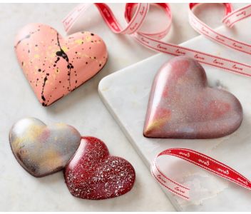 Chocolate Candy Heart filled with Vanilla Marshmallow Passion Fruit Caramel and Chocolate Crunchy Almonds