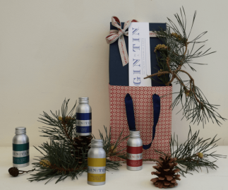 FOUR CHRISTMAS GINS IN A NAVY BLUE GIFT BOX